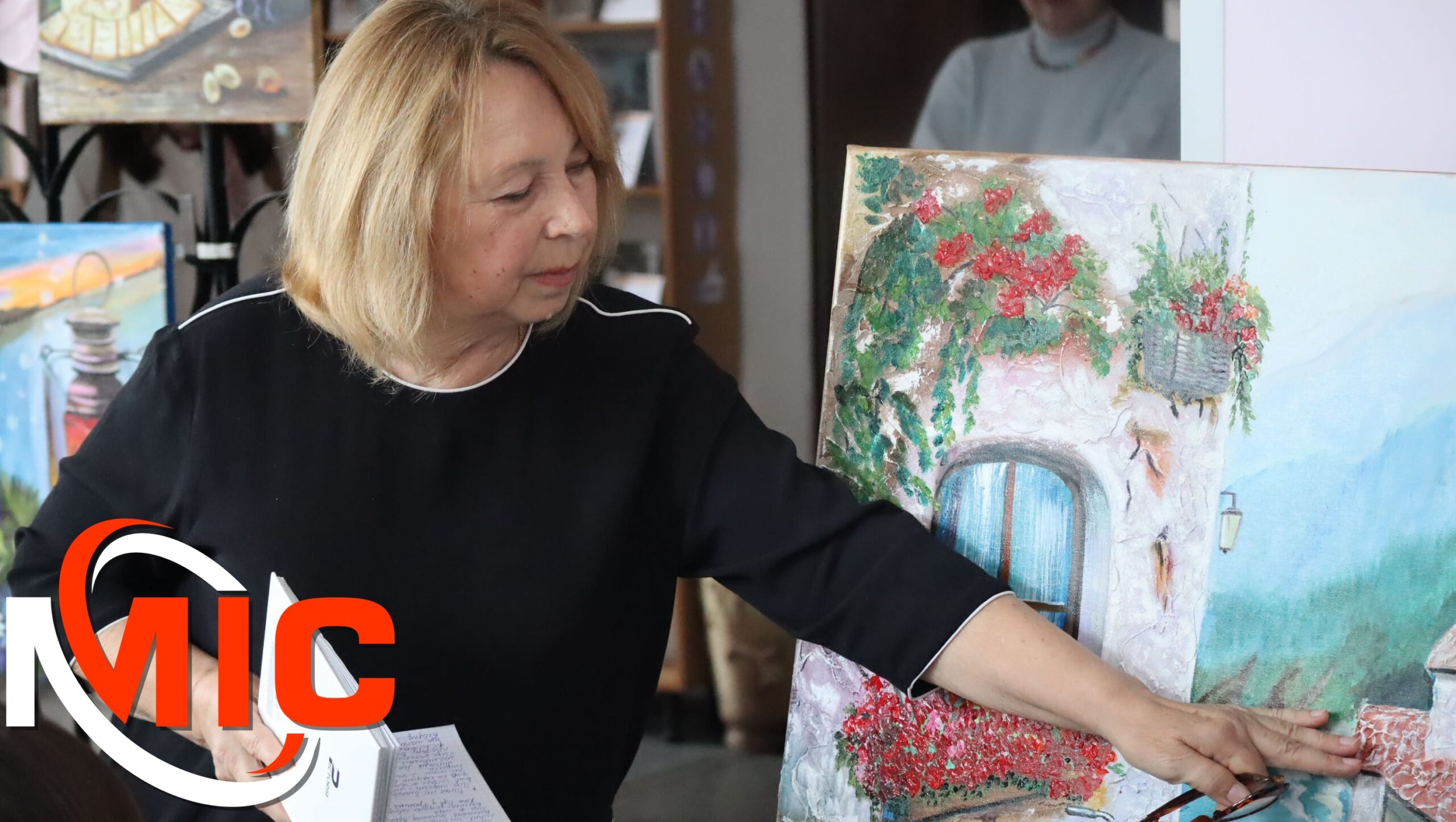 Фото до матеріалу: Виставка Зої Машкіної: квітковий сад у бібліотеці Кам'янського