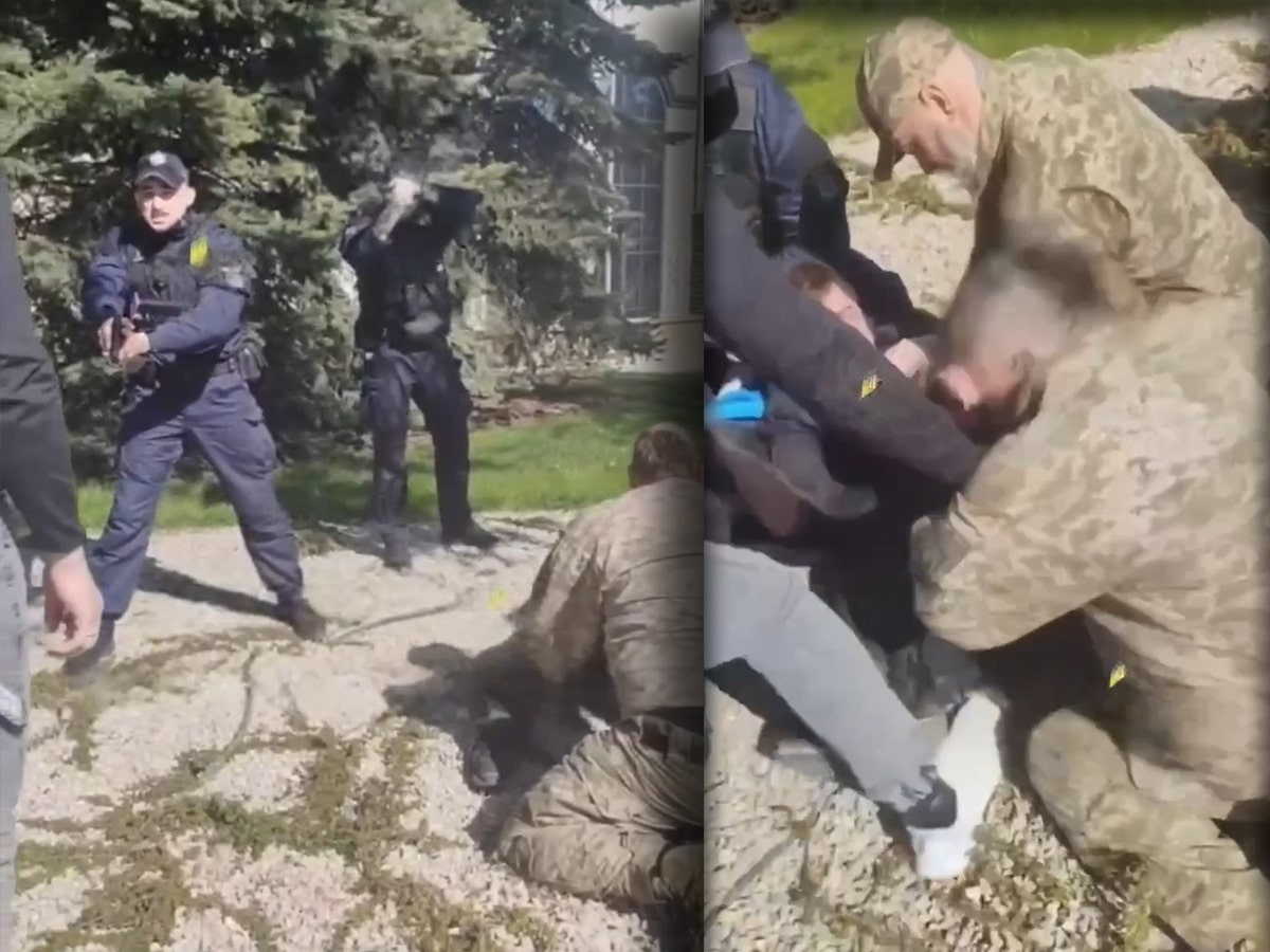 Фото до матеріалу: У Києві поліція показала зброю під час конфлікту з ТЦК